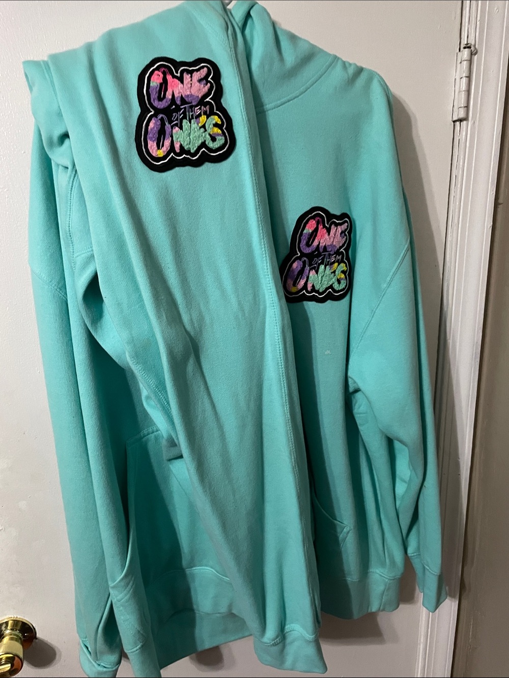 Aqua Hooded Jacket with Colorful 'One of the Ones' Patch top & bottom